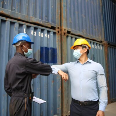 professional-engineer-staff-team-checking-and-inspect-container-for-international-business-logistic_t20_ynO39O